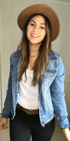 Brown hat and belt with black jeans and jean jacket outfit 