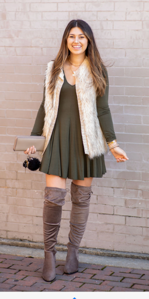 Green dress with fur vest and OTK boots 