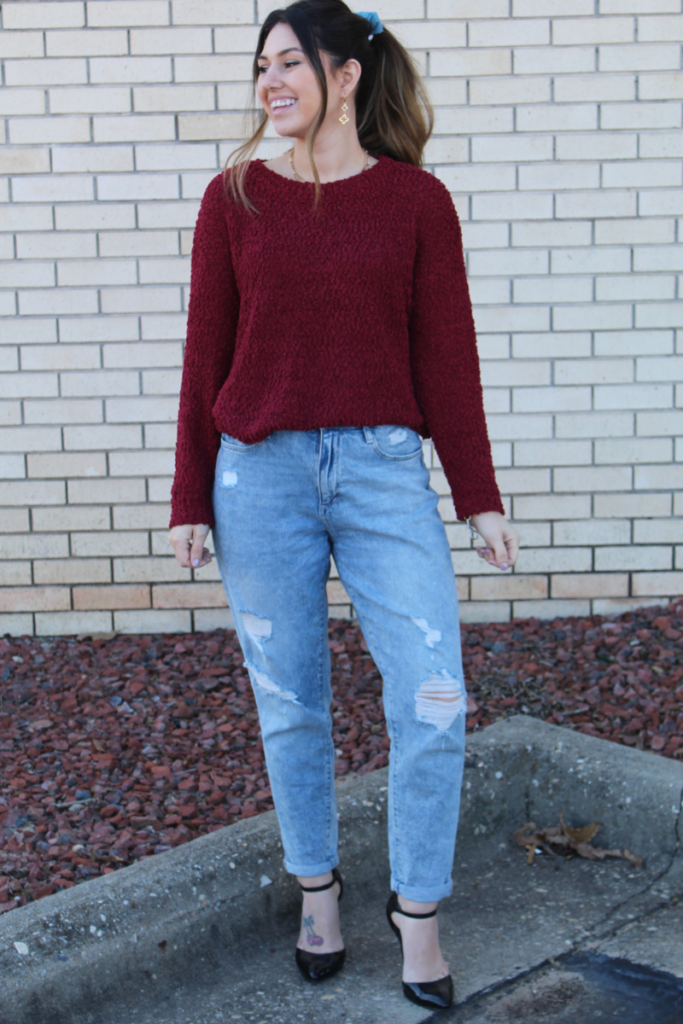marron sweater with jeand and heels 