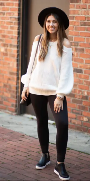 styling sneaker wedges with leggin gs and an oversized sweater